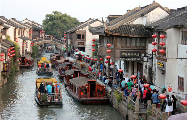 The water town of Suzhou and Chongqing's Fengdu Ghost Town are among the hot tourist destinations during public holidays. (Photo provided to China Daily)