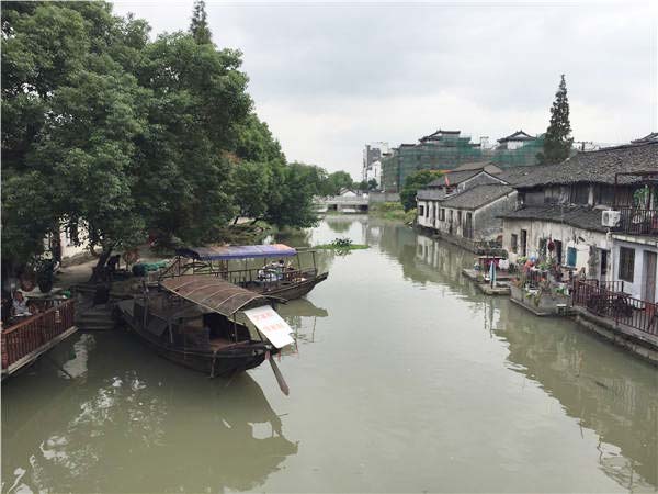 Nanzha, the southern area of Wuzhen in Zhejiang province, unlike other parts of the water town, still keeps its original look. Photos by Yang Feiyue/China Daily and Provided to China Daily