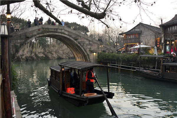 The Xizha area, one of the most popular destinations in Wuzhen, is home to many ancient bridges. (Photo provided to China Daily)