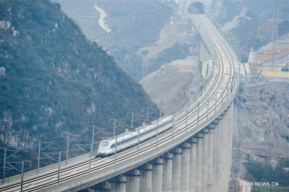 A test train in seen on the Guizhou West section of the Shanghai-Kunming high-speed railway, Dec. 17, 2016. (Xinhua/Ou Dongqu)