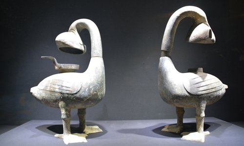 A pair of antique lanterns, each featuring a goose holding a fish in its mouth, are on display at the Jiangxi Provincial Museum in Nanchang.