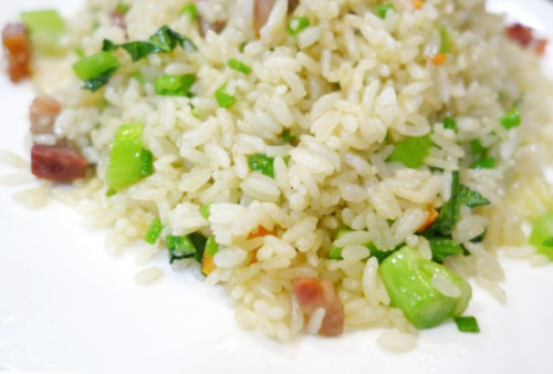 Fried rice with mustard greens and salty cured meats. (Photo Provided to China Daily)