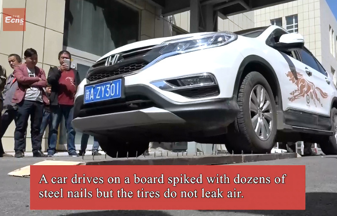 Watch a car drive over nails and not puncture!