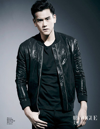 Chinese actor Eddie Peng Yuyan poses during a photoshoot for the August issue of VOGUE. [Photo provided to China Daily]
