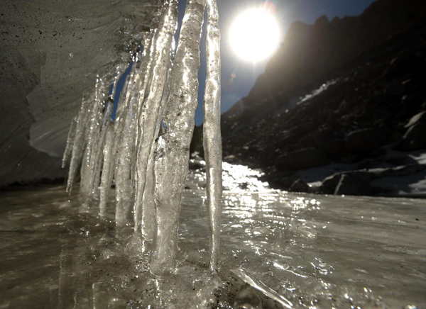 The Touming Mengke glacier, also called Laohu Valley No 12 glacier, the largest valley glacier in the Qilian Mountain Range, located in Subei Mongolian autonomous county, Gansu province in Northwest China, Oct 27, 2013. In 2005, it was listed in Chinese National Geography magazine as one of China's six most beautiful glaciers. [Photo/Xinhua]