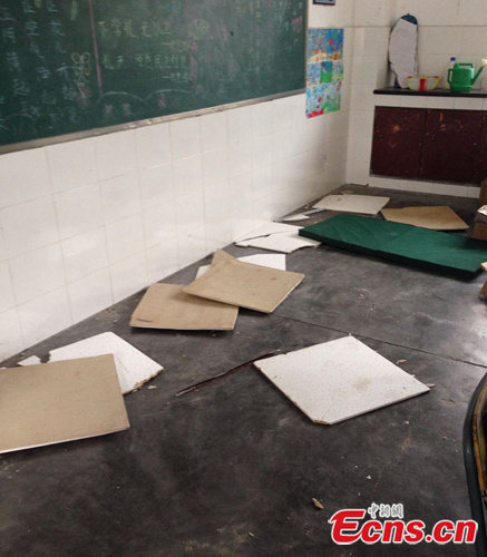 Photo shows fallen pieces in a classroom of a local primary school after a 4.8-magnitude earthquake hit Qingchuan County, Southwest China's Sichuan Province, at 7:54 am on Tuesday, June 10, 2014.