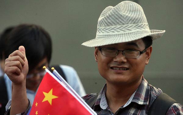 A Chinese evacuee from Libya arrives at Piraeus port, Greece, on Aug 2, 2014. [Photo/Xinhua]