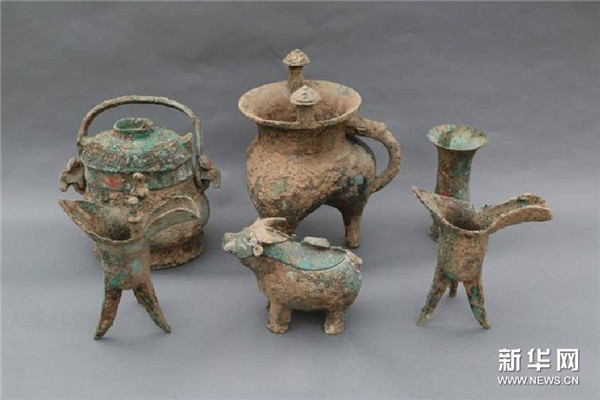 Bronze ware unearthed from Xi Ji's tomb in a Western Zhou Dynasty graveyard in Northwest China's Shaanxi province. [Photo/Xinhua]