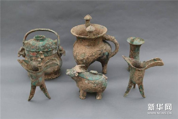 Bronze ware unearthed from Xi Ji's tomb in a Western Zhou Dynasty graveyard in Northwest China's Shaanxi province. [Photo/Xinhua]