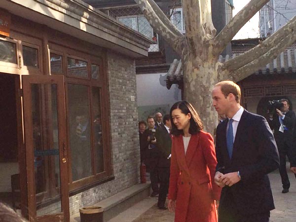 Britain's Duke of Cambridge, Prince William (R2) visits Shijia Hutong Museum in Beijing on March 2, 2015. (Photo: Chen Mengwei/For chinadaily.com.cn)