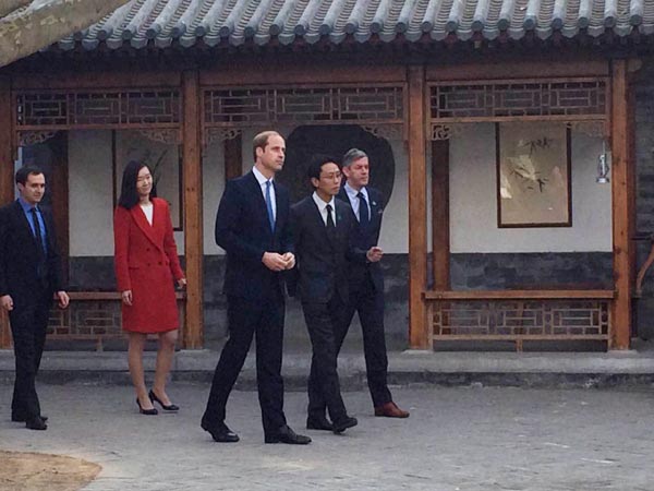 Britain's Duke of Cambridge, Prince William (C) visits Shijia Hutong Museum in Beijing on March 2, 2015. (Photo: Chen Mengwei/For chinadaily.com.cn)