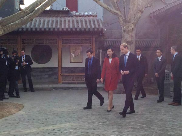 Britain's Duke of Cambridge, Prince William (front) visits Shijia Hutong Museum in Beijing on March 2, 2015. (Chen Mengwei/For chinadaily.com.cn)