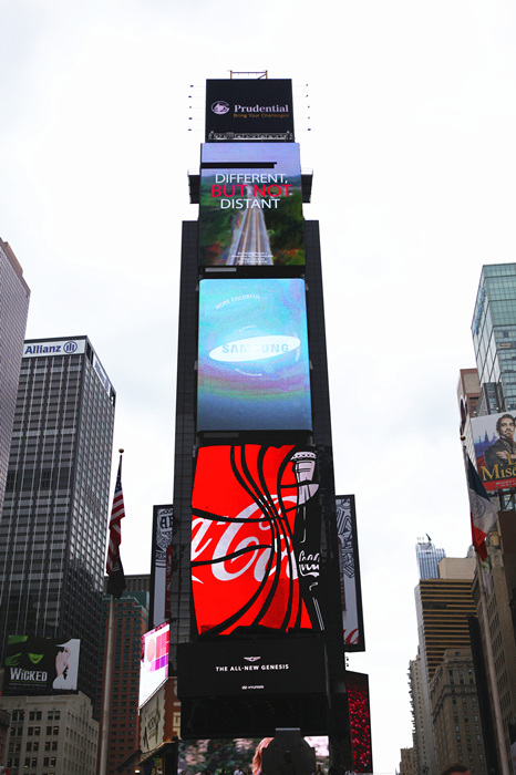 CHINA and U.S., DIFFERENT, BUT NOT DISTANT is the message of a video on a large screen overlooking Broadway and 47th Street in New York City's Times Square. The 30-second video started running Tuesday and will run 200 times a day during Chinese President Xi Jinping's state visit. Made by the Chinese People's Association for Friendship with Foreign Countries, the video shows symbols of Chinese and American culture, including Chinese calligraphy, an American cowboy, a Peking opera singer and Western and Chinese chess boards.HEZI JIANG/CHINA DAILY
