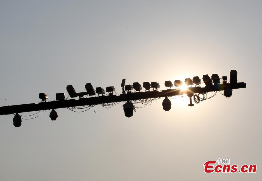 Cameras hover like sparrows over road in Hangzhou