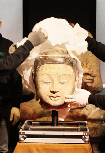 Stolen Buddha statue head arrives in Hebei museum