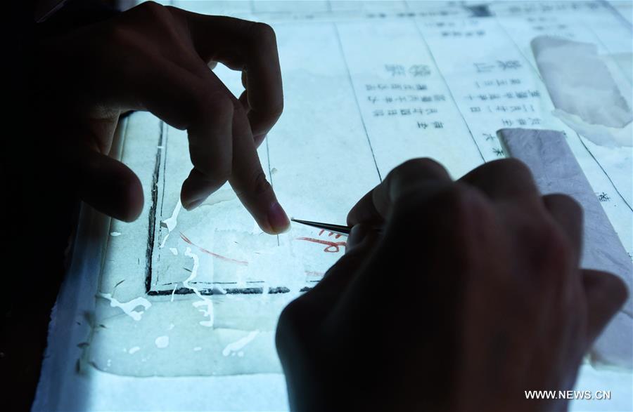 Special exhibition on ancient book restoration held in Hangzhou