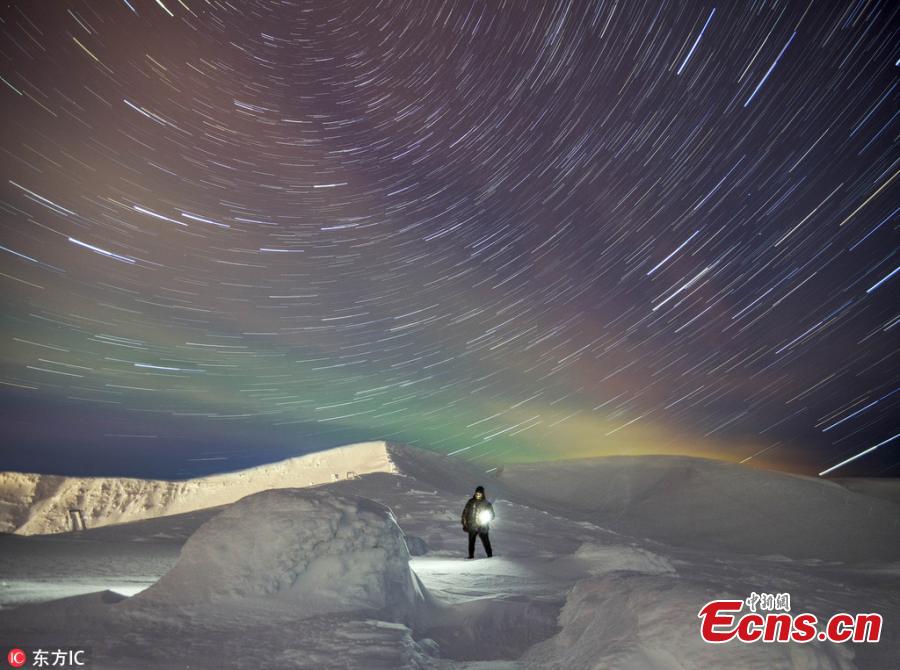 Aurora borealis turns the sky greener than the ground