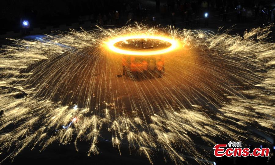 Traditional fireworks stunt sparkles for Lantern Festival