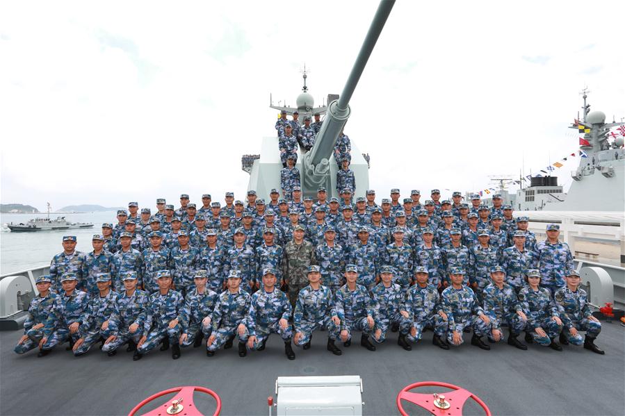 President Xi reviews navy in South China Sea