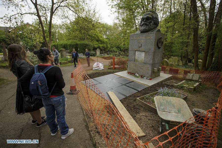 People visit tomb of Karl Marx at Highgate Cemetery in London