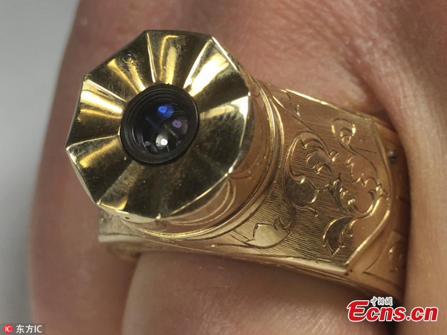 This 14K solid gold ring is actually a Soviet era spy camera 
