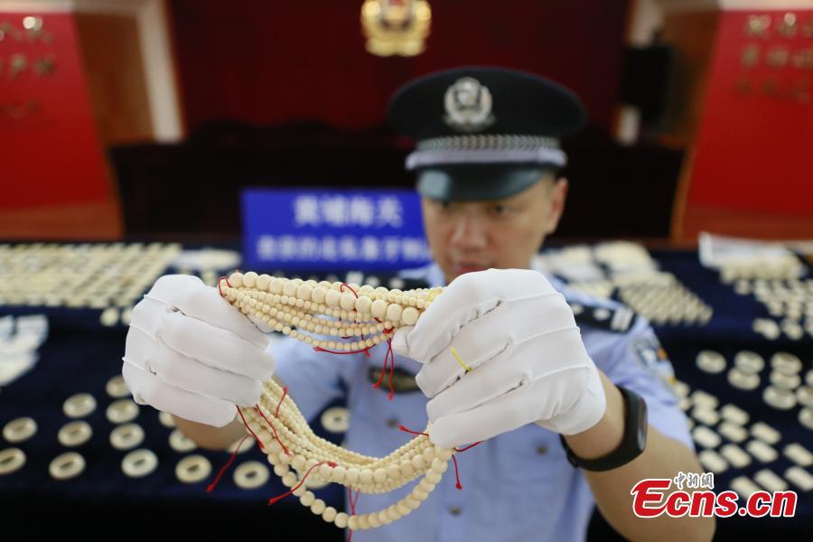2 suspects held in major ivory smuggling case in Guangzhou 