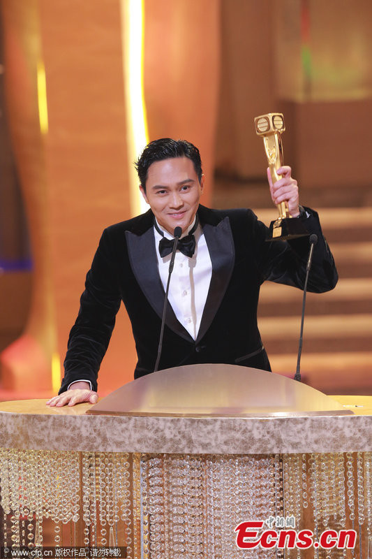
Chilam Cheung wins Most Popular Male Character award for his performance in Triumph in the Skies 2 at 2013 TVB Anniversary Awards on December 16, 2013. [Photo/CFP]