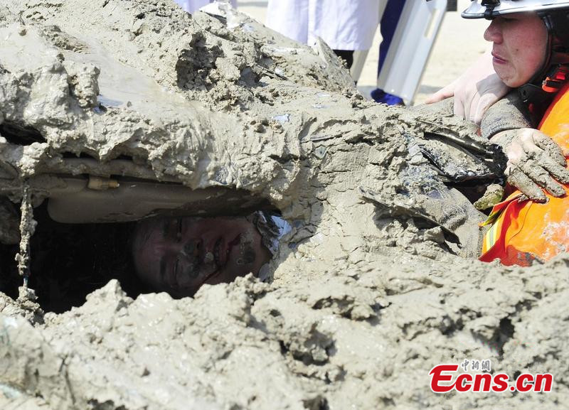 Woman driver, buried in wet cement, survives (3/3) Headlines