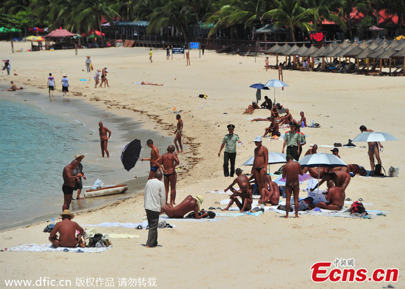 Two detained for skinny dipping, naked sunbathing in Sanya 