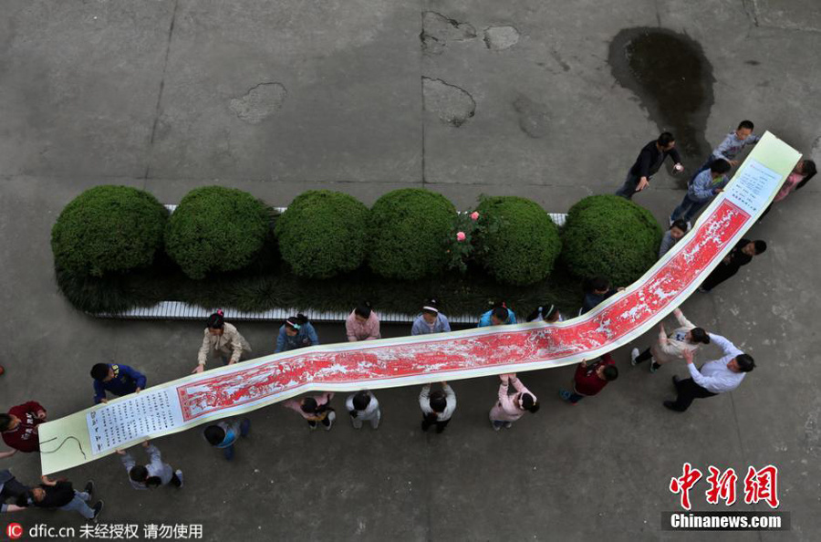 Pupils make 12m long paper-cut of famous Chinese riverside scroll (2/3)
