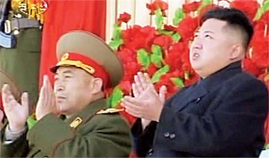 This screen grab taken off North Korea's state television shows North Korean leader Kim Jong-un on the podium of Pyongyang's Kumsusan Memorial Palace during a military parade Thursday. Photo: AFP
