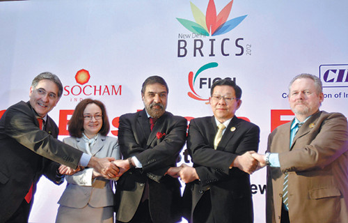 Chen Deming (second right), China's minister of commerce, attends the BRICS Summit Forum in New Delhi on March 28 along with his counterparts from Brazil, Russia, India and South Africa. [Photo/Agencies]