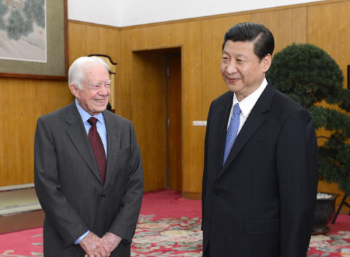 General Secretary of the Communist Party of China (CPC) Central Committee Xi Jinping (R) meets with former U.S. President Jimmy Carter in Beijing, capital of China, Dec. 13, 2012. Xi stressed that both China and the United States should be innovative and 