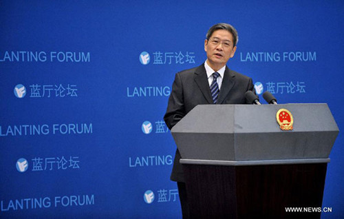 Chinese Vice Foreign Minister Zhang Zhijun answers questions from the press at the Eighth Lanting Forum in Beijing, capital of China, Dec. 28, 2012. [Xinhua]