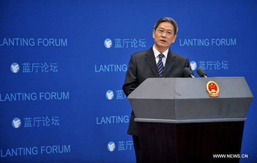 Chinese Vice Foreign Minister Zhang Zhijun answers questions from the press at the Eighth Lanting Forum in Beijing, capital of China, Dec. 28, 2012. [Xinhua]