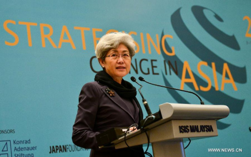 Fu Ying, chairwoman of the Foreign Affairs Committee of the 12th National People's Congress of the People's Republic of China, addresses the 27th Asia-Pacific Roundtable meeting at Kuala Lumpur, Malaysia, on June 4, 2013. The three-day Asia-Pacific Roundtable, with the theme  Strategizing Change in Asia, will see senior officials, diplomats, policy-makers and academics from all over the region discuss a wide range of issues. (Xinhua/Chong Voon Chung)