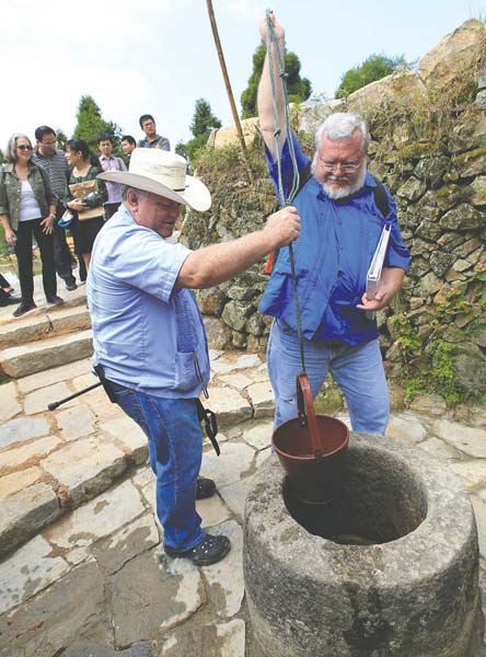 Family members of Milton Gardner revisit Guling in 2012. Provided to China Daily 
