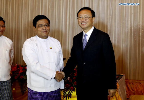  Myanmar Vice President U Nyan Tun (L) meets with visiting Chinese State Councilor Yang Jiechi in Nay Pyi Taw, Myanmar, June 23, 2013. Yang Jiechi arrived in Myanmar Sunday for a two-day visit. (Xinhua/U Aung) 