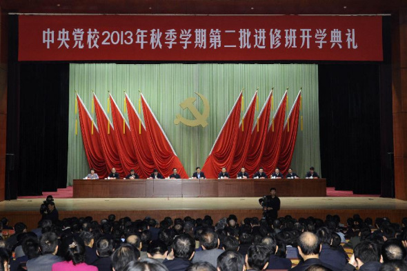 Liu Yunshan (6th L, back), president of the Party School of the Communist Party of China (CPC) Central Committee and a member of the Standing Committee of the Political Bureau of the CPC Central Committee, addresses the opening ceremony of the school's 2013 fall semester second batch program in Beijing, capital of China, Nov. 14, 2013. (Xinhua/Rao Aimin) 