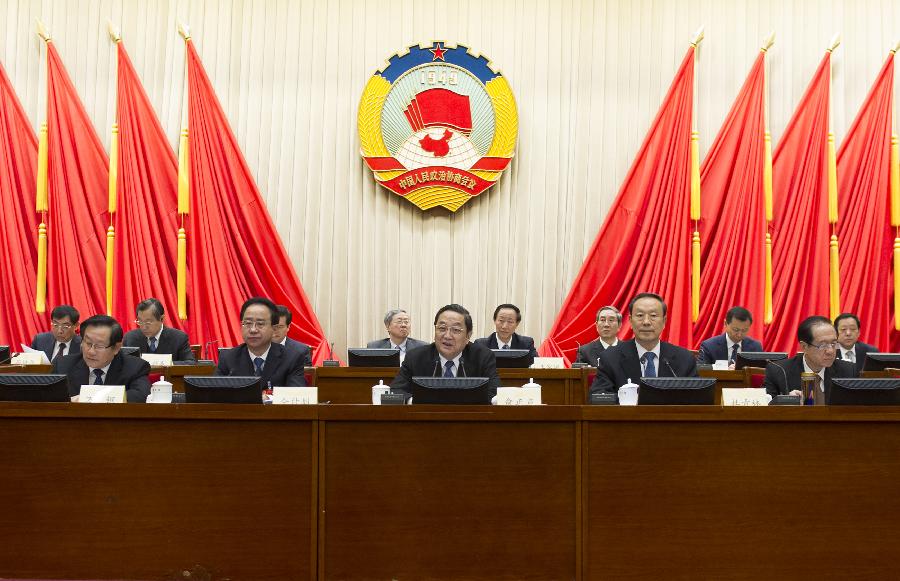 Yu Zhengsheng, chairman of the National Committee of Chinese People's Political Consultative Conference (CPPCC), addresses a conclusion meeting of the third session of the Standing Committee of the 12th National Committee of CPPCC, in Beijing, capital of China, Nov. 20, 2013. (Xinhua/Xie Huanchi)