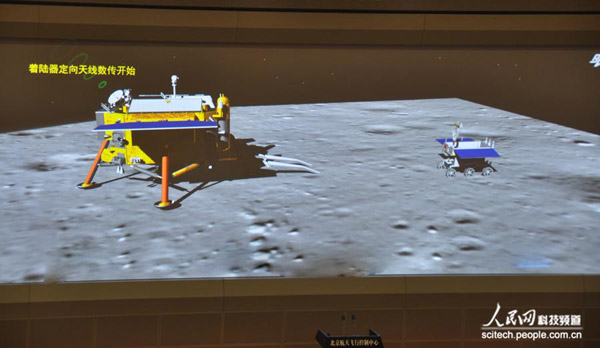 China's first moon rover, Yutu, or Jade Rabbit, and the lander took photos of each other on the moon's surface Sunday night, a day after the country completed its first lunar soft landing.(Photo/People's Daily Online)