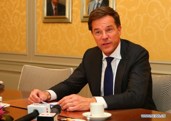 Dutch Prime Minister Mark Rutte is interviewed by Xinhua News Agency in Hague, the Netherlands, March 17, 2014. (Xinhua/Gong Bing)