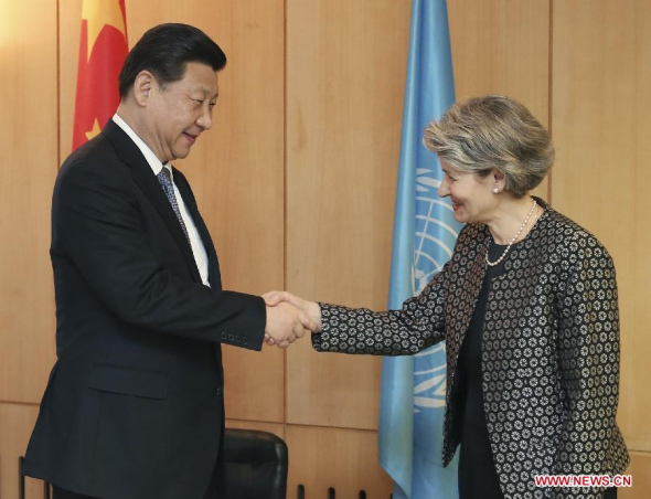 Chinese President Xi Jinping (L) meets with Irina Bokova, Director-General of the United Nations Educational, Scientific and Cultural Organization (UNESCO), in Paris, France, March 27, 2014. (Xinhua/Yao Dawei)