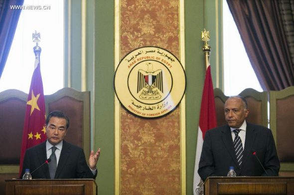 China's Foreign Minister Wang Yi (L) and his Egyptian counterpart Sameh Shoukry attend a joint press conference in Cairo, Egypt, Aug 3, 2014. (Xinhua/Cui Xinyu)