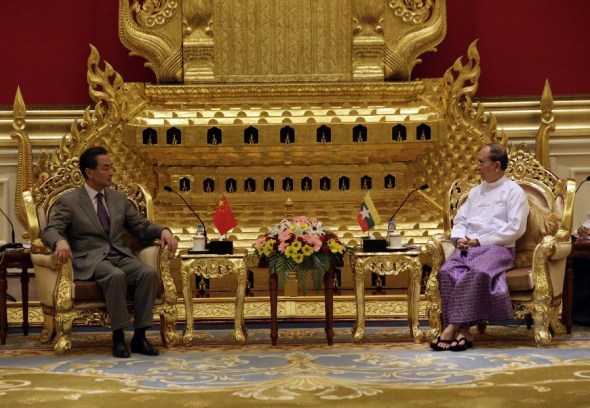 Myanmar President U Thein Sein (R) meets with visiting Chinese Foreign Minister Wang Yi in Nay Pyi Taw, Myanmar, Aug. 11, 2014. (Xinhua/U Aung)