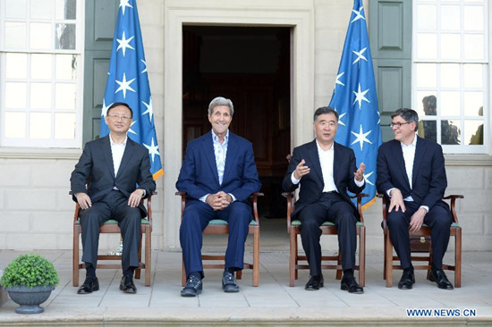 Chinese Vice Premier Wang Yang (2nd R), Chinese State Councilor Yang Jiechi (1st L), U.S. Secretary of State John Kerry (2nd L) and U.S. Treasury Secretary Jacob Lew pose for photos at Mount Vernon, the home of first U.S. President George Washington, in Virginia, the United States, on June 22, 2015. (Photo: Xinhua/Yin Bogu)