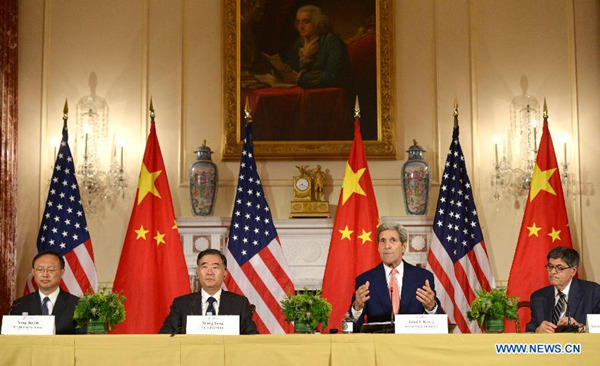 Chinese Vice Premier Wang Yang (2nd L), Chinese State Councilor Yang Jiechi (1st L), U.S. Secretary of State John Kerry (2nd R) and U.S. Treasury Secretary Jacob Lew attend a joint press conference after the seventh China-U.S. Strategic and Economic Dialogue (S&ED) in Washington D.C., the United States, June 24, 2015. (Photo: Xinhua/Yin Bogu)