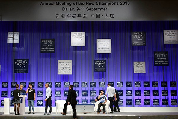 Organizing staff prepare for the upcoming Annual Meeting of the New Champions 2015 in Dalian. (Photo/Xinhua)