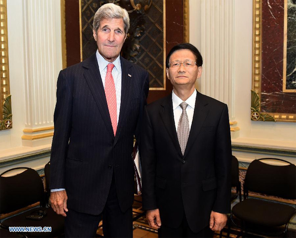 President Xi Jinping's special envoy Meng Jianzhu, a member of the Political Bureau of the Central Committee of the Communist Party of China (CPC) and head of the Commission for Political and Legal Affairs of the CPC Central Committee meets with U.S. Secretary of State John Kerry, in Washington D.C., capital of the United States, Sept. 11, 2015. China and the United States have reached important consensus on combating cyber crimes. (Photo/Xinhua)