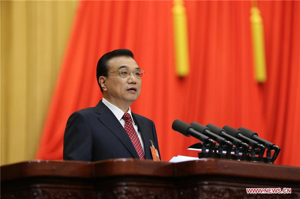 Chinese Premier Li Keqiang delivers a government work report during the opening meeting of the fourth session of the 12th National People's Congress at the Great Hall of the People in Beijing, capital of China, March 5, 2016. (Xinhua/Liu Weibing)